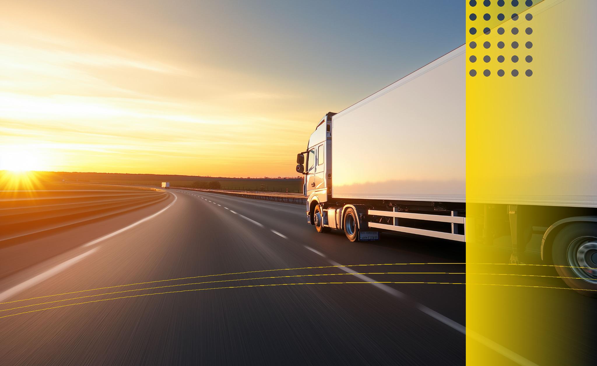 White truck driving on highway at sunset with golden lighting